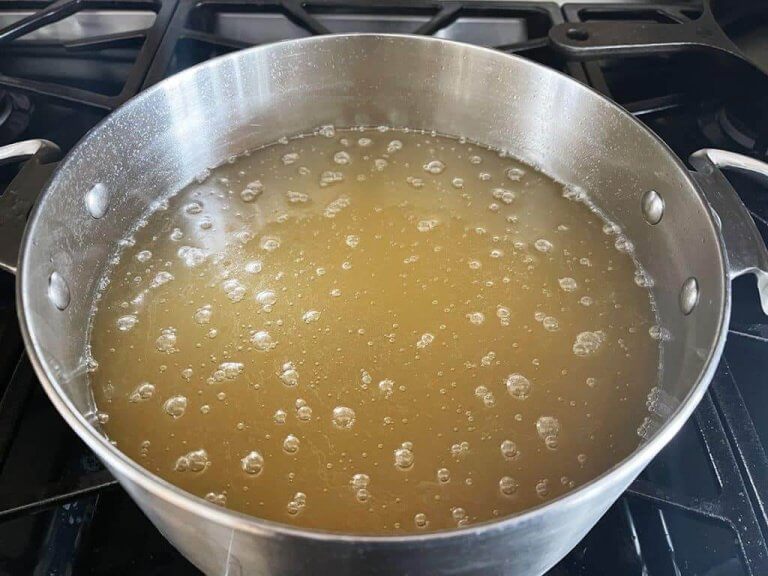 Tallow bubbling indicates water